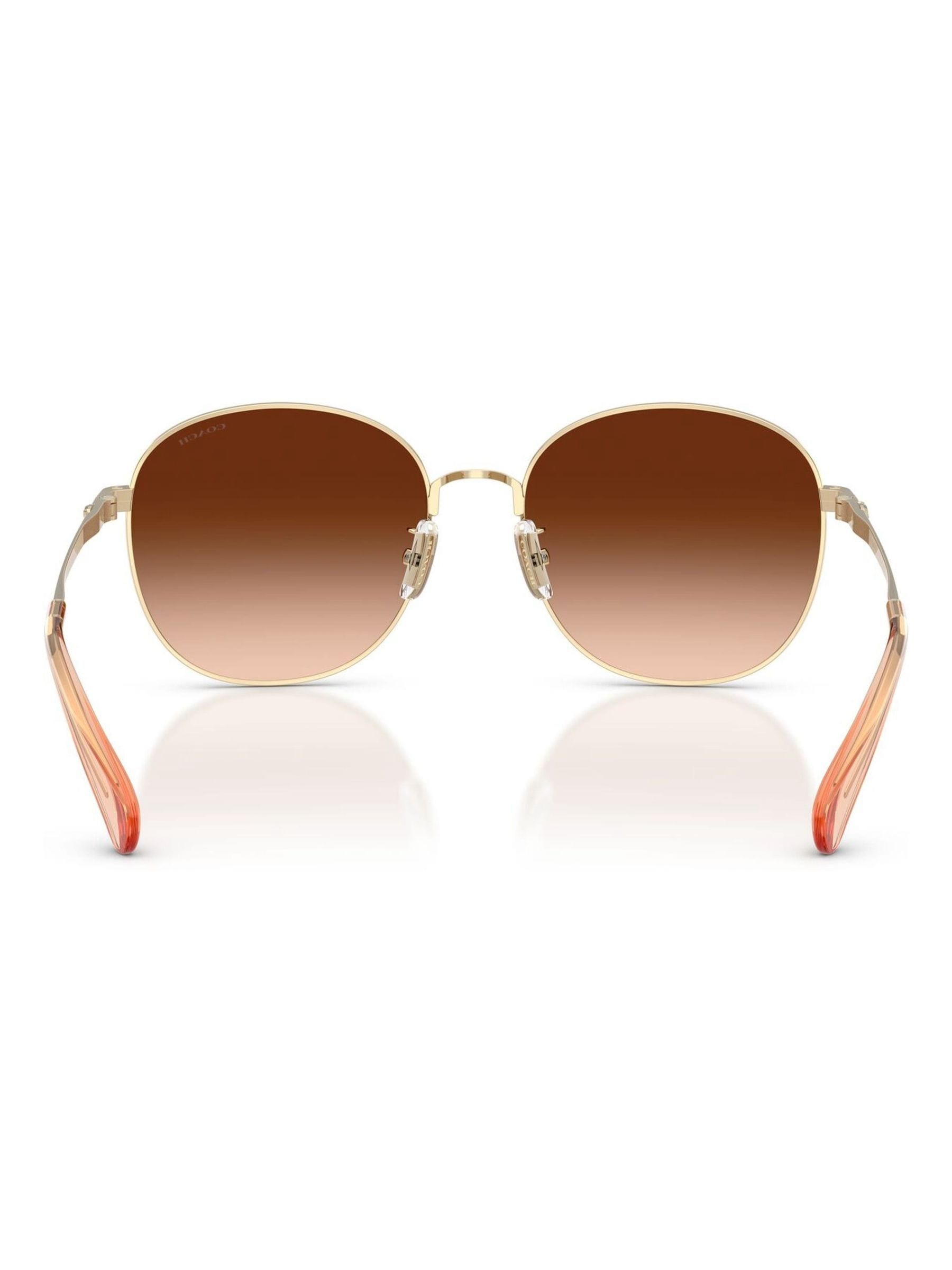 Coach gold round sunglasses with metal frames, imported from the UK