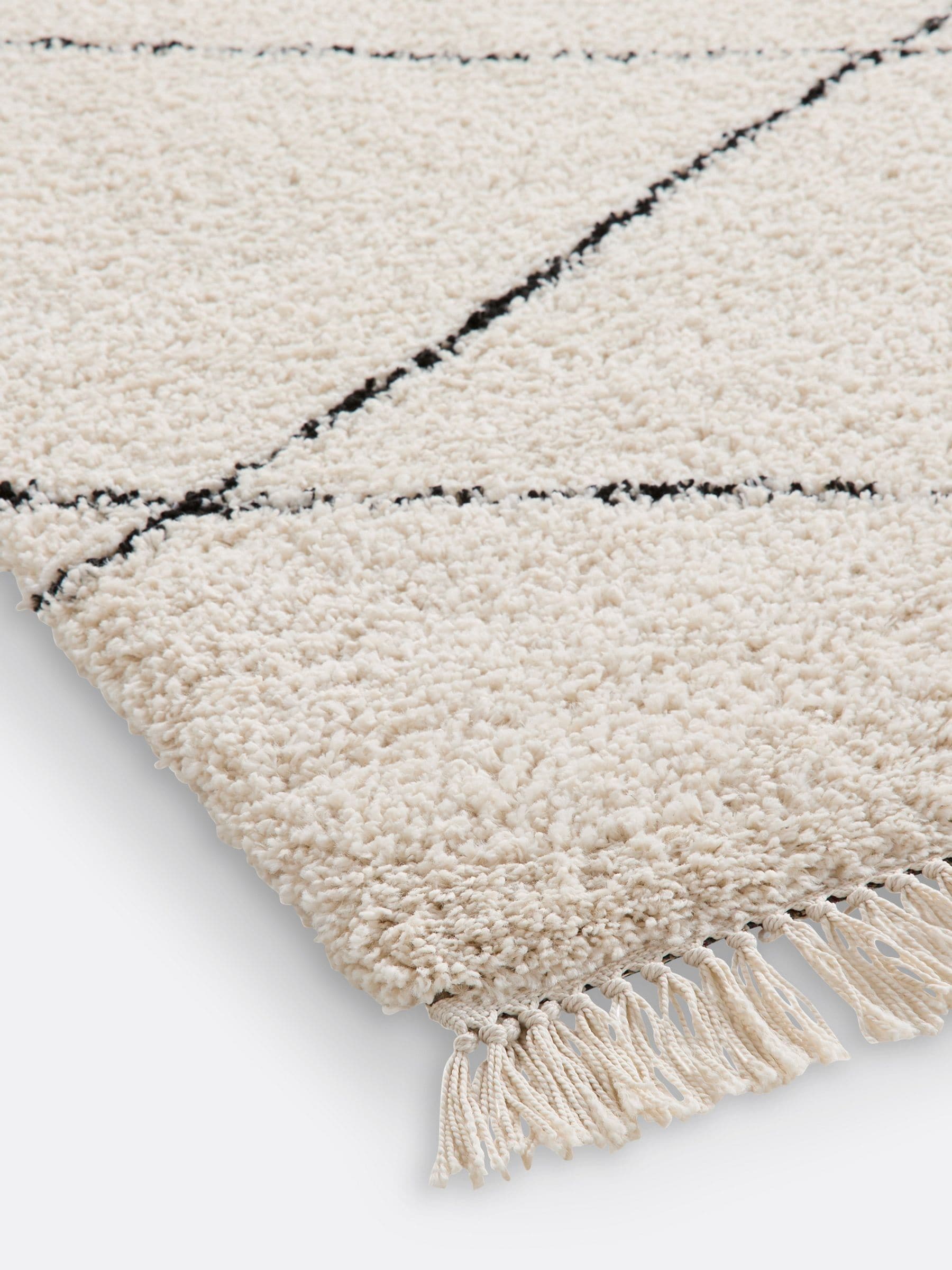 La Redoute Intérieurs Fatouh fringed Berber style rug in ecru, imported from the UK