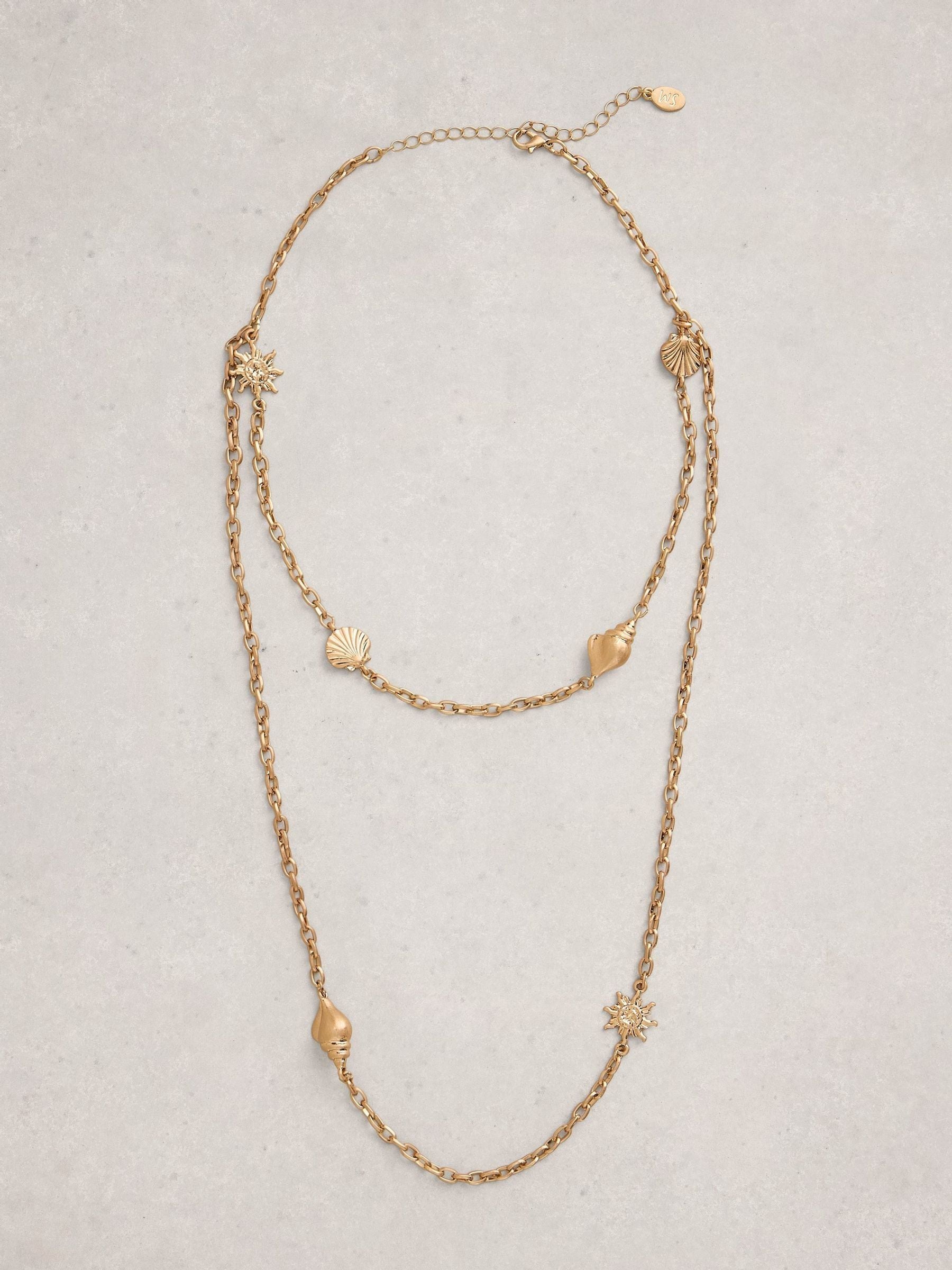 White Stuff gold tone necklace with shell charms, imported from the UK