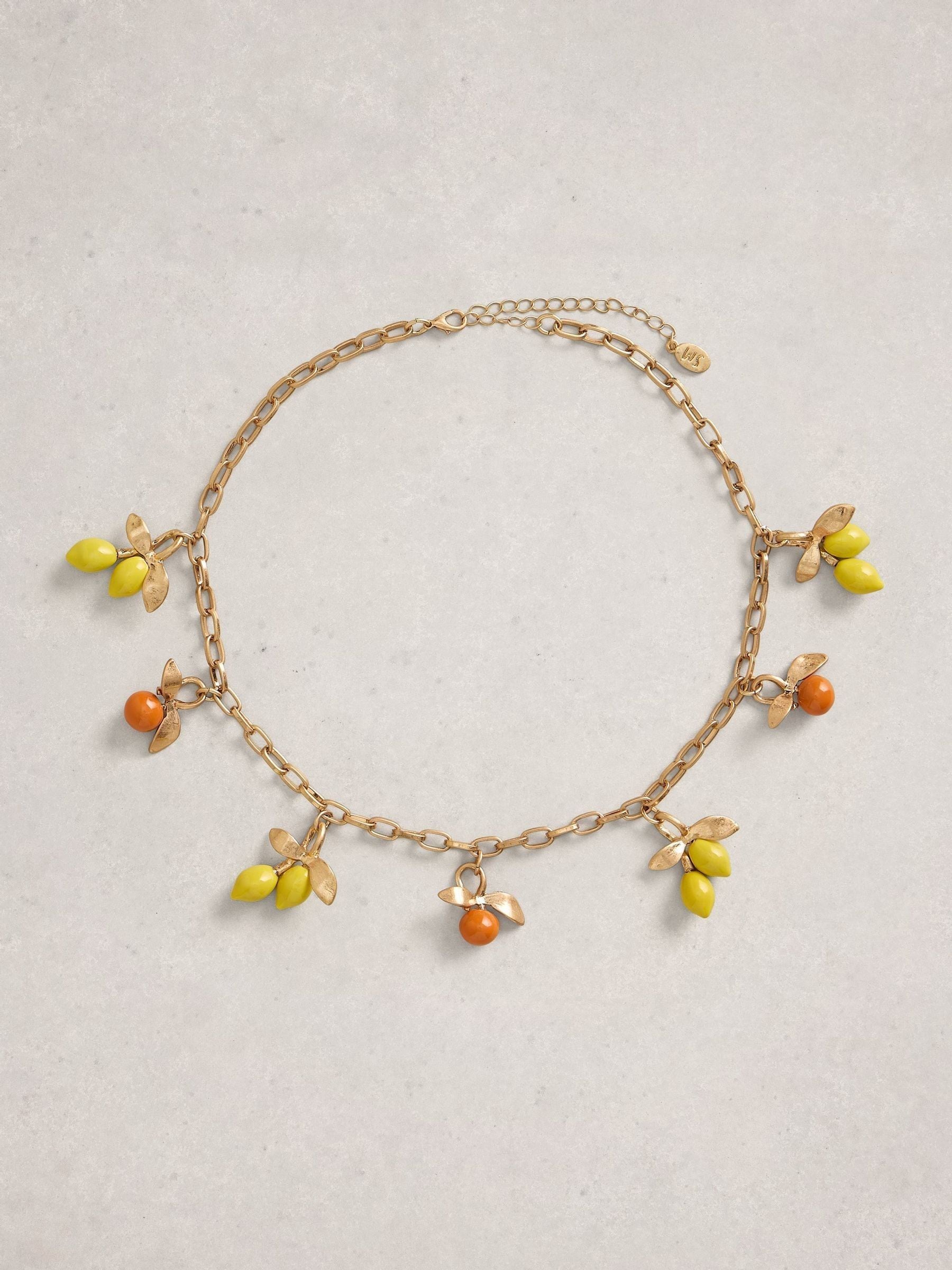 White Stuff yellow citrus charm necklace, UK version