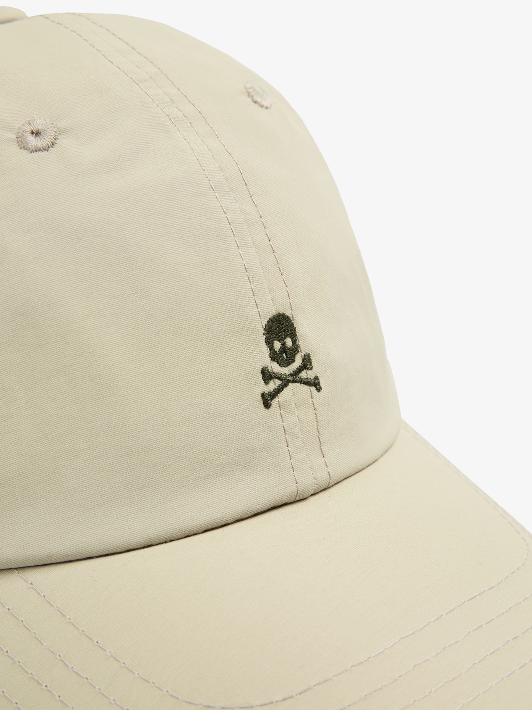 Scalpers cream hood cap with adjustable closure, British brand