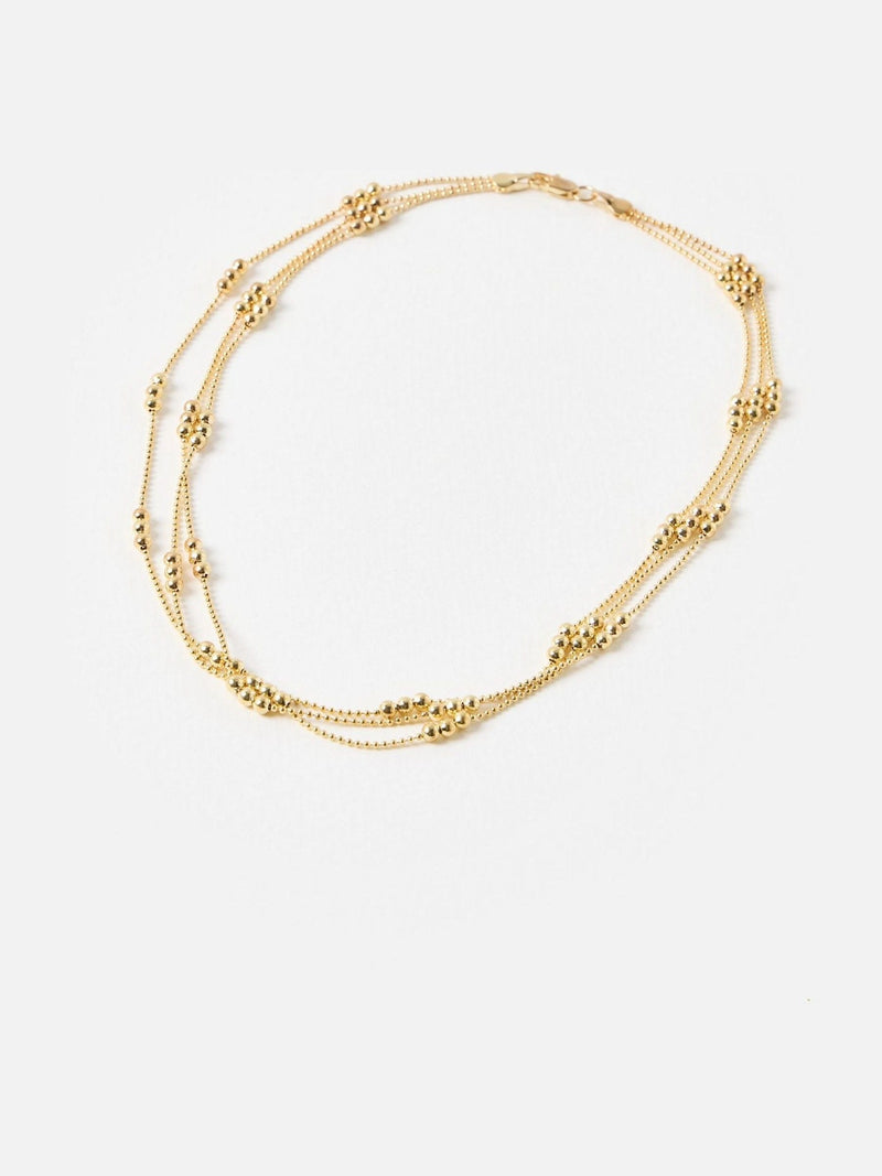 Oliver Bonas triple row ball gold necklace, UK version