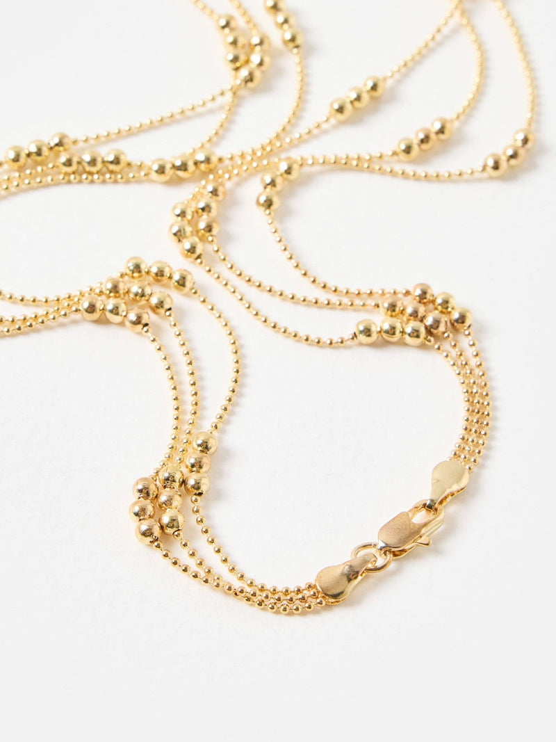 Oliver Bonas triple row ball gold necklace, UK version