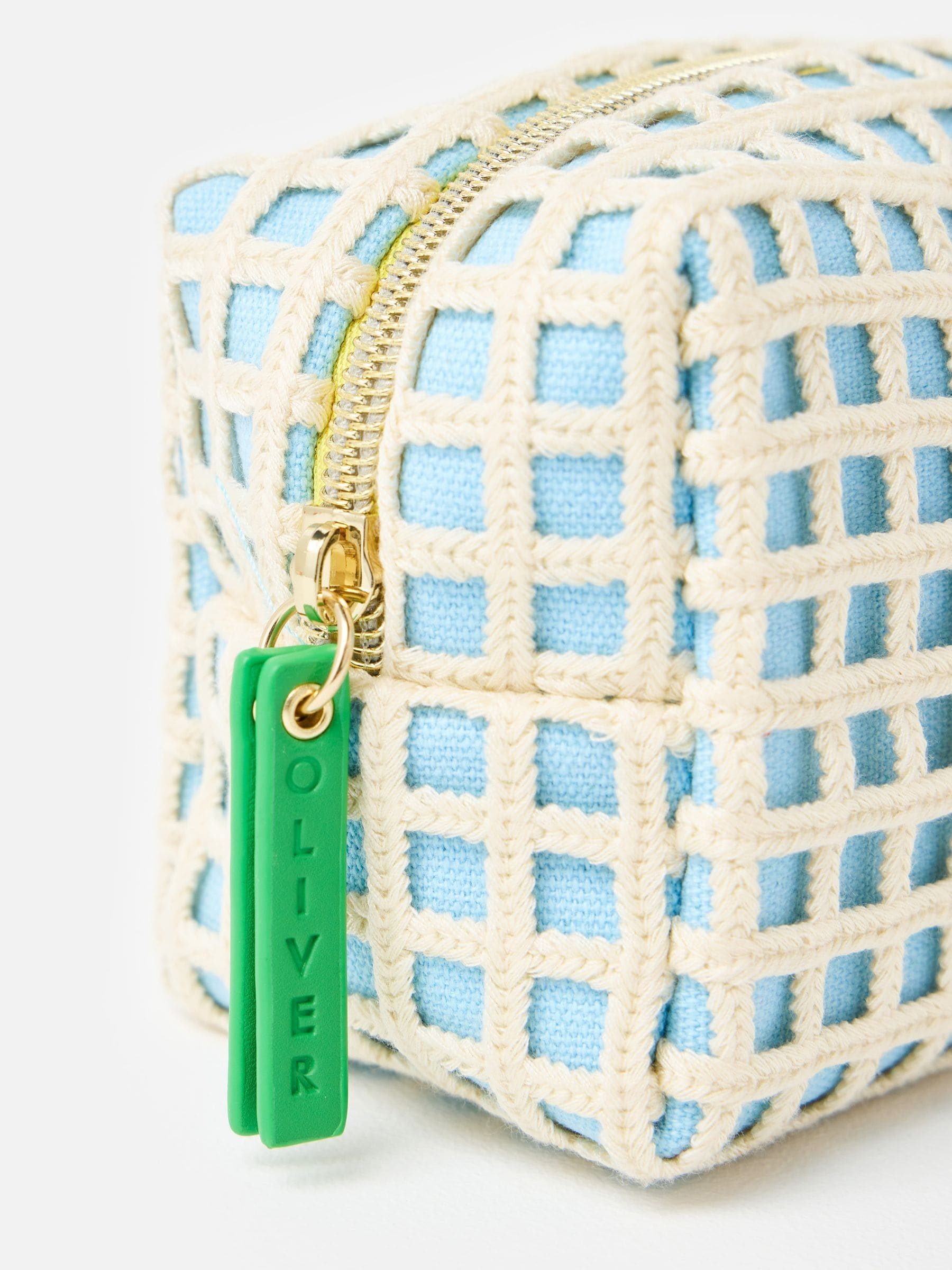 Oliver Bonas blue crochet makeup bag with lemon motif (British brand)