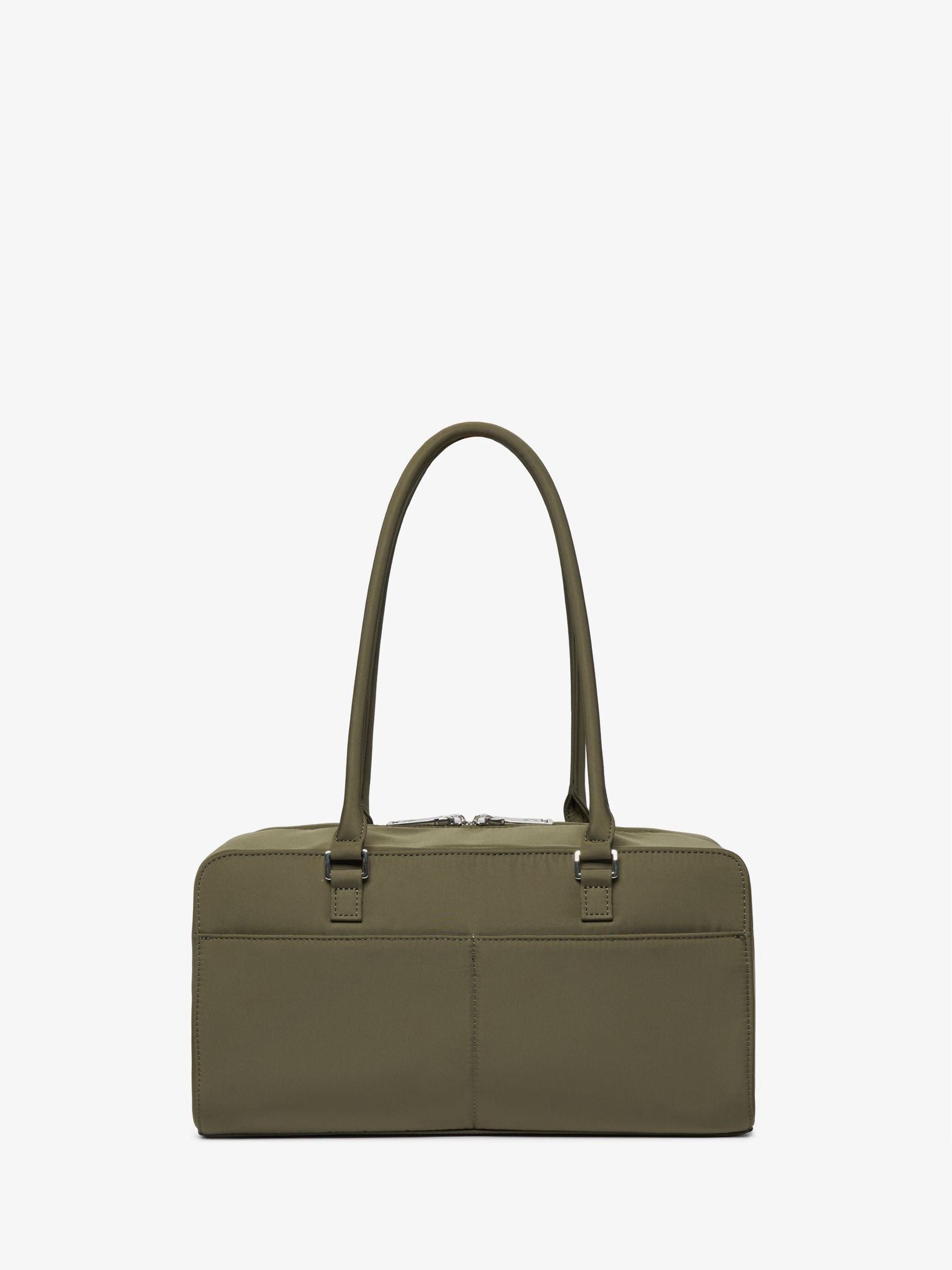 Tiba + Marl Green Riley changing bag, UK version
