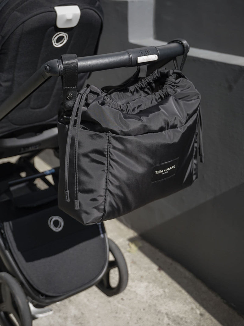 Tiba + Marl Black Luna drawstring changing tote - British product