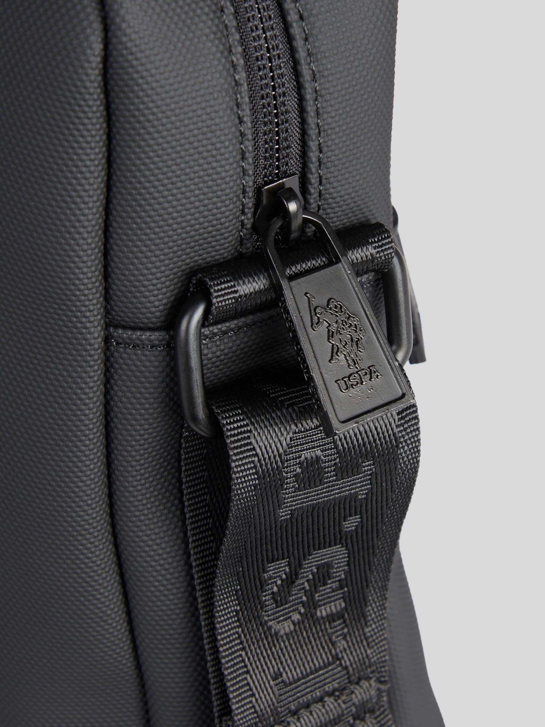 U.S. Polo Assn. black arrowhead cross-body bag, imported from the UK