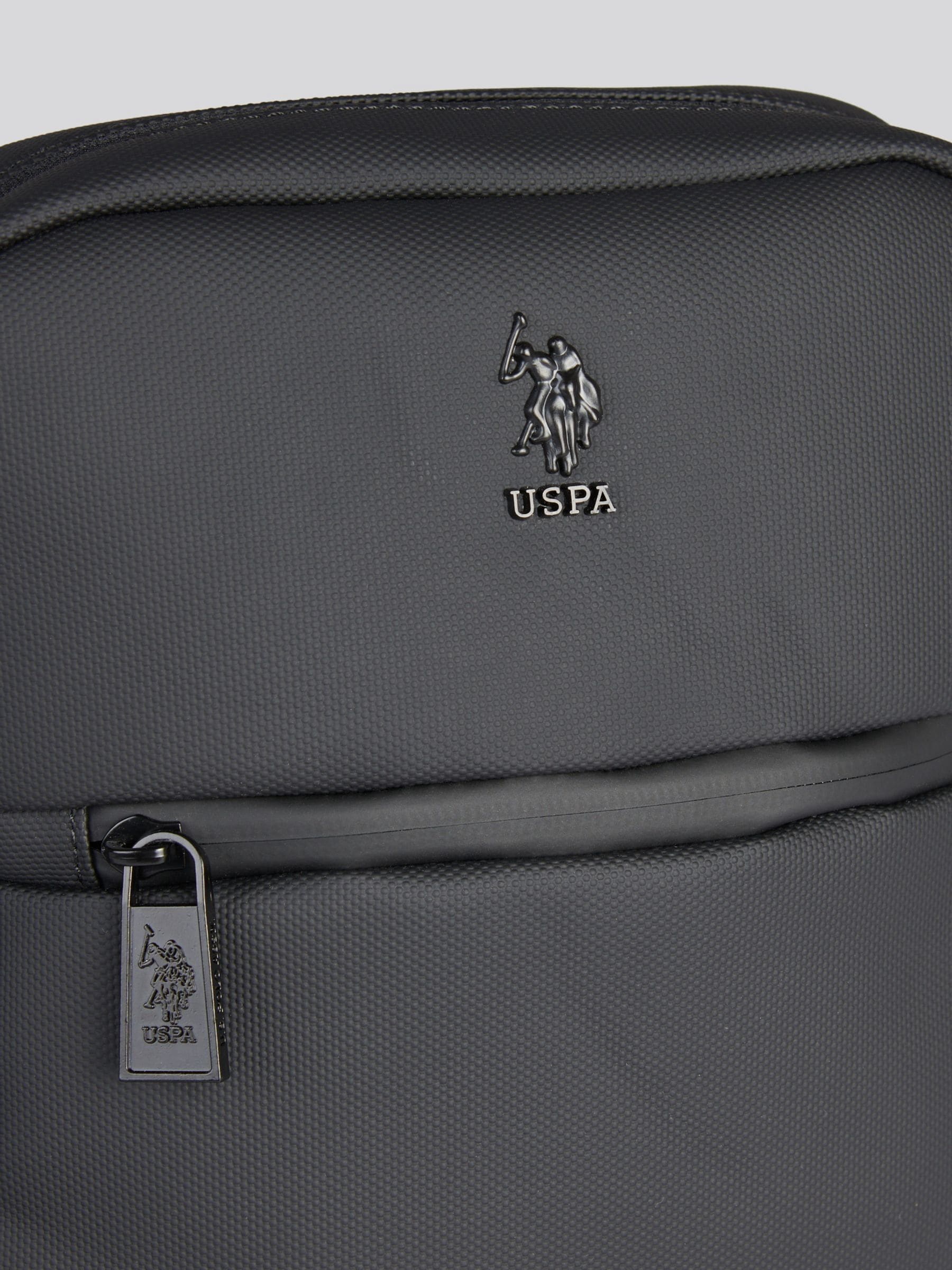 U.S. Polo Assn. black arrowhead cross-body bag, imported from the UK