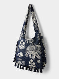 Joe Browns blue embroidered safari tassel handbag (British brand)