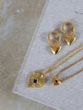 Ottoman Hands gold heart pendant blue cubic zirconia, imported from the UK