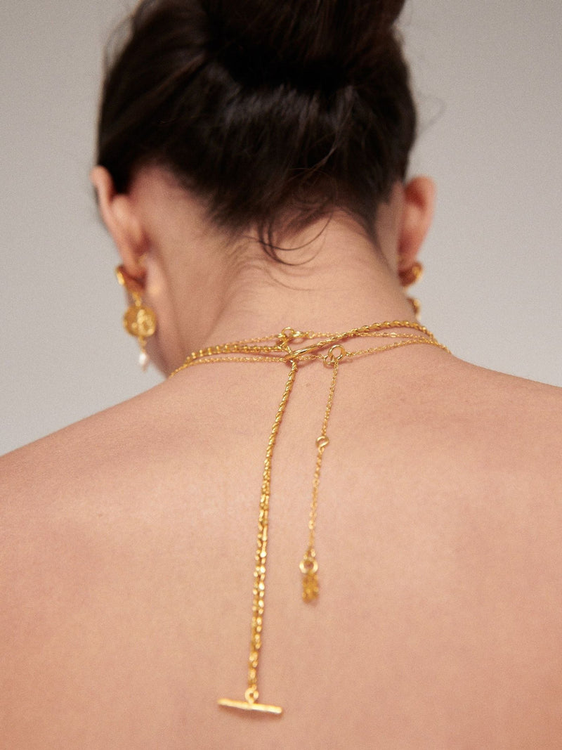 Ottoman Hands Thea snake chain necklace gold tone t-bar (British brand)