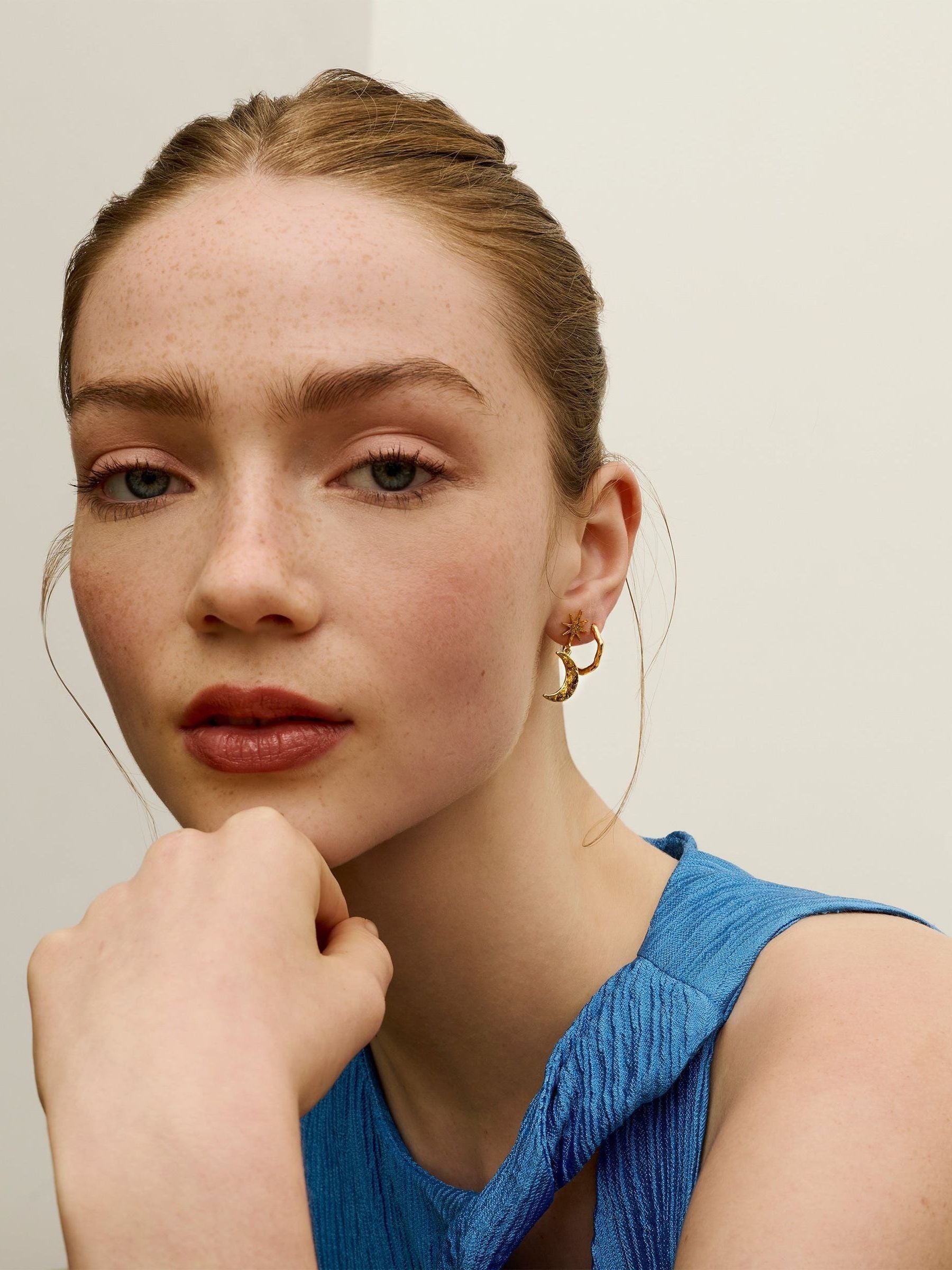 Ottoman Hands gold tone moon and star drop stud earrings, imported from the UK