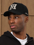 MAUVAIS Black Monogram Trucker Cap in cotton twill (British brand)