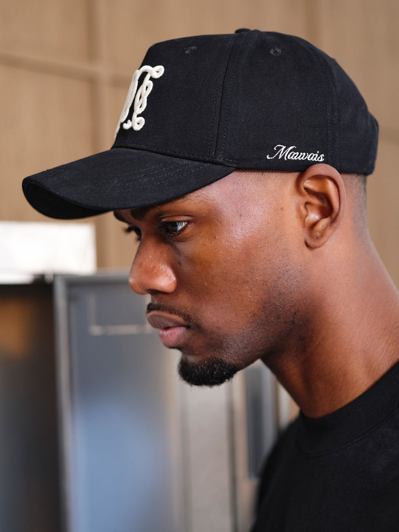 MAUVAIS Black Monogram Trucker Cap in cotton twill (British brand)