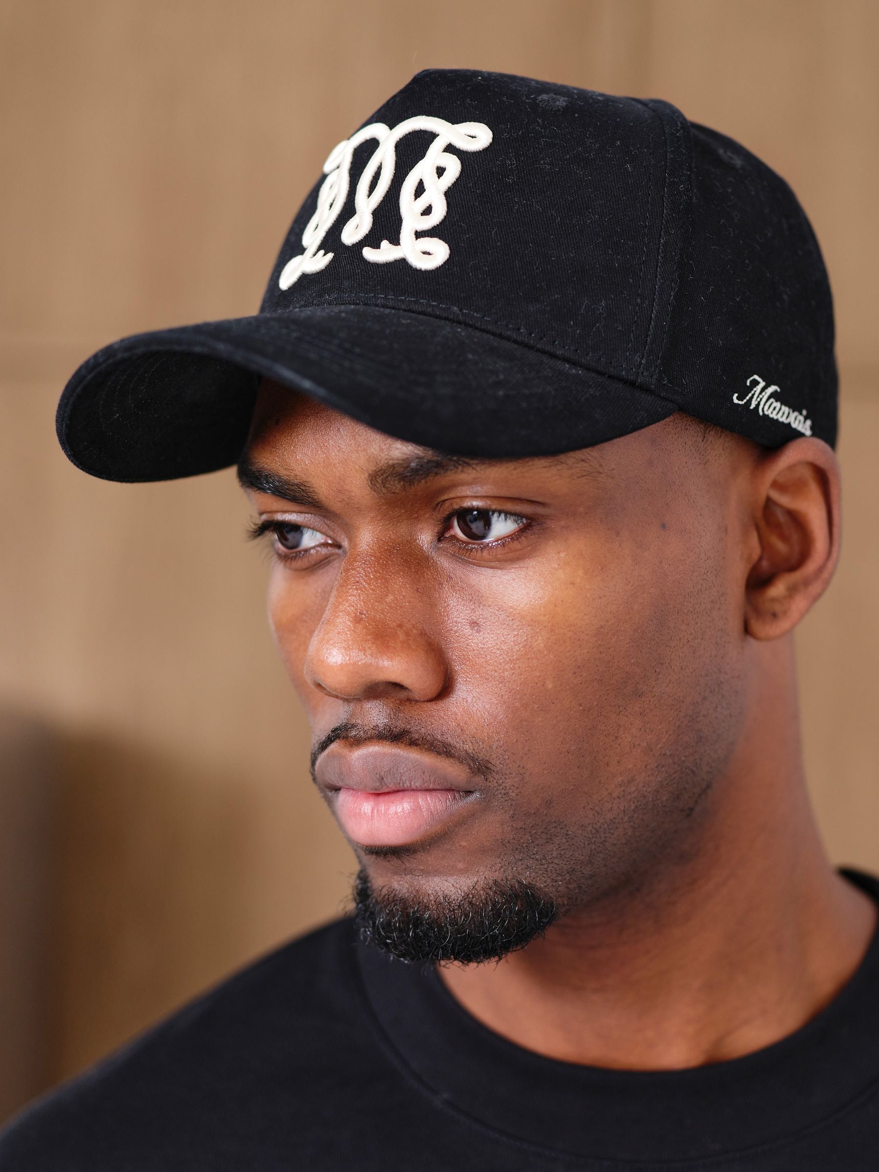 MAUVAIS Black Monogram Trucker Cap in cotton twill (British brand)