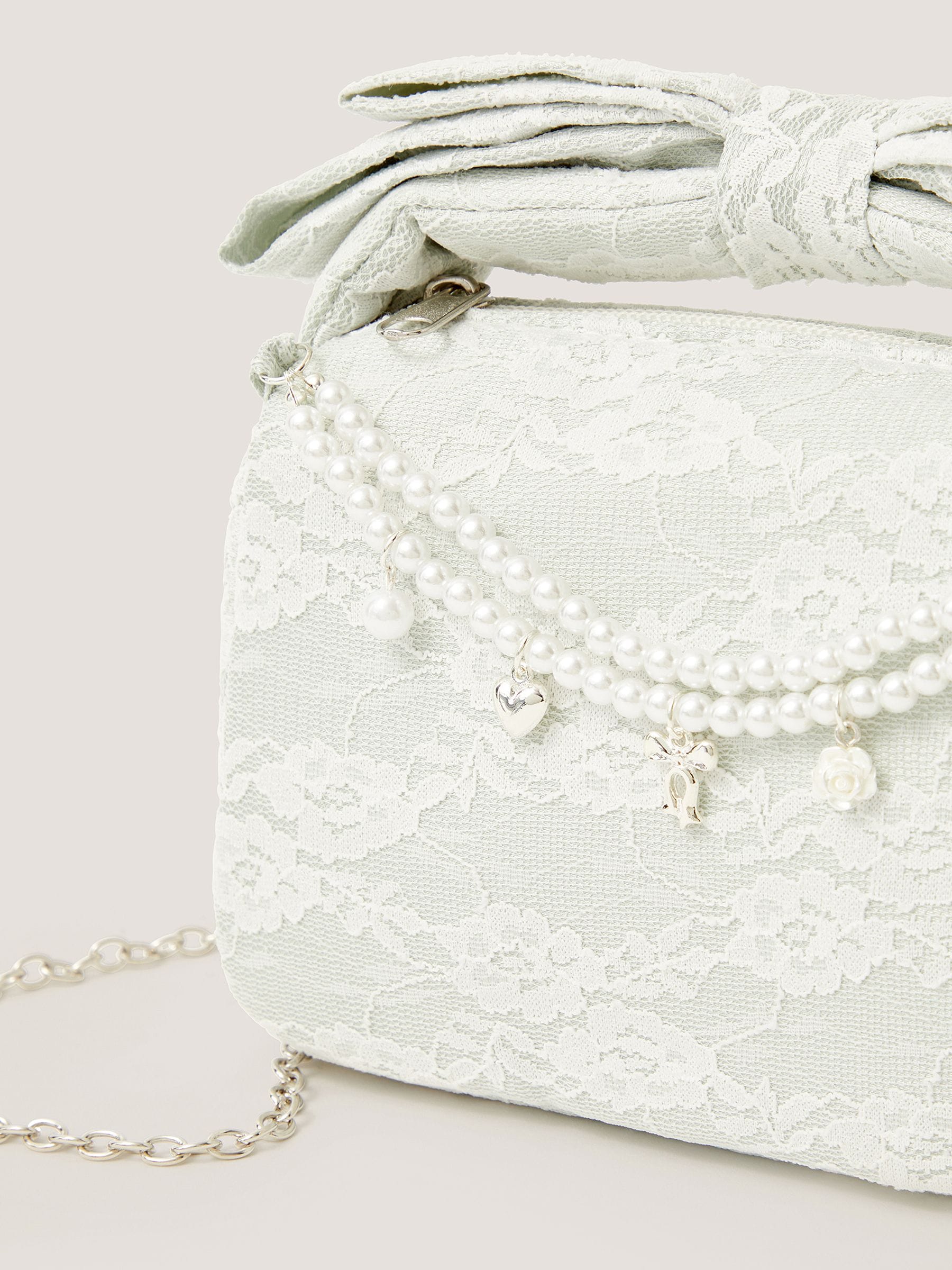 Monsoon green lace bag with pearl charms, imported from the UK