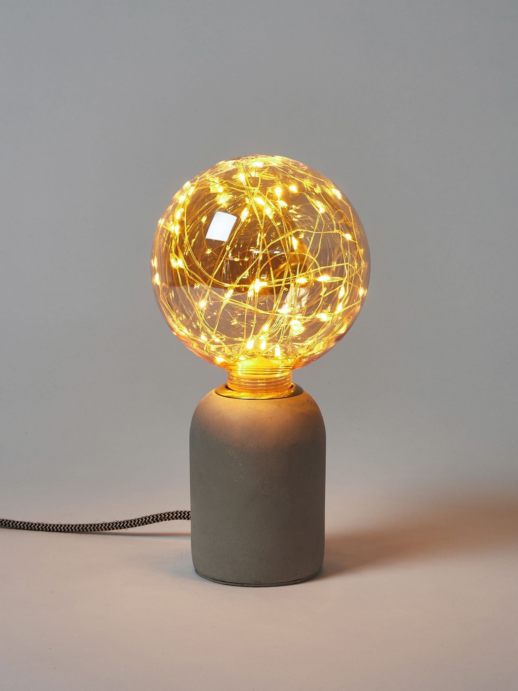Oliver Bonas Gold Stars LED bulb 17cm, imported from the UK
