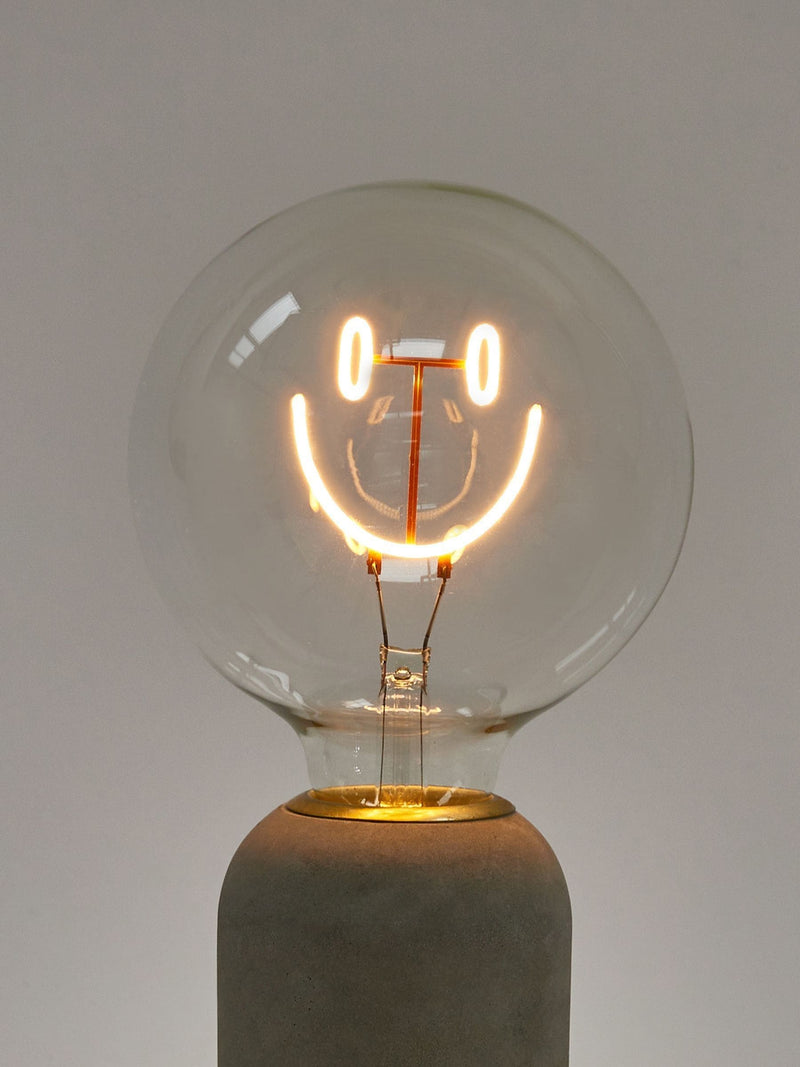 Oliver Bonas yellow happy face LED light bulb E27 (British brand)