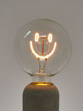 Oliver Bonas yellow happy face LED light bulb E27 (British brand)