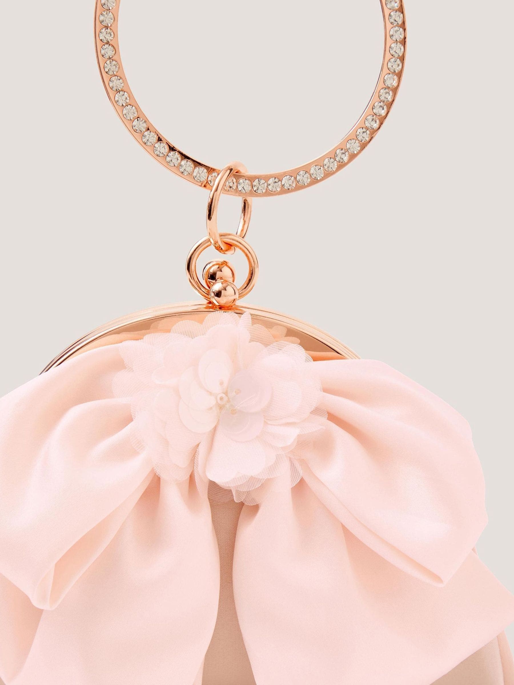 Monsoon pink sequin bow bangle bag, UK version