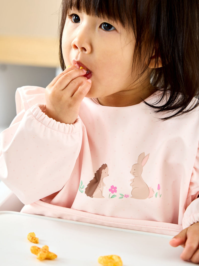 JoJo Maman Bébé pink woodland frill sleeved baby bib, imported from the UK