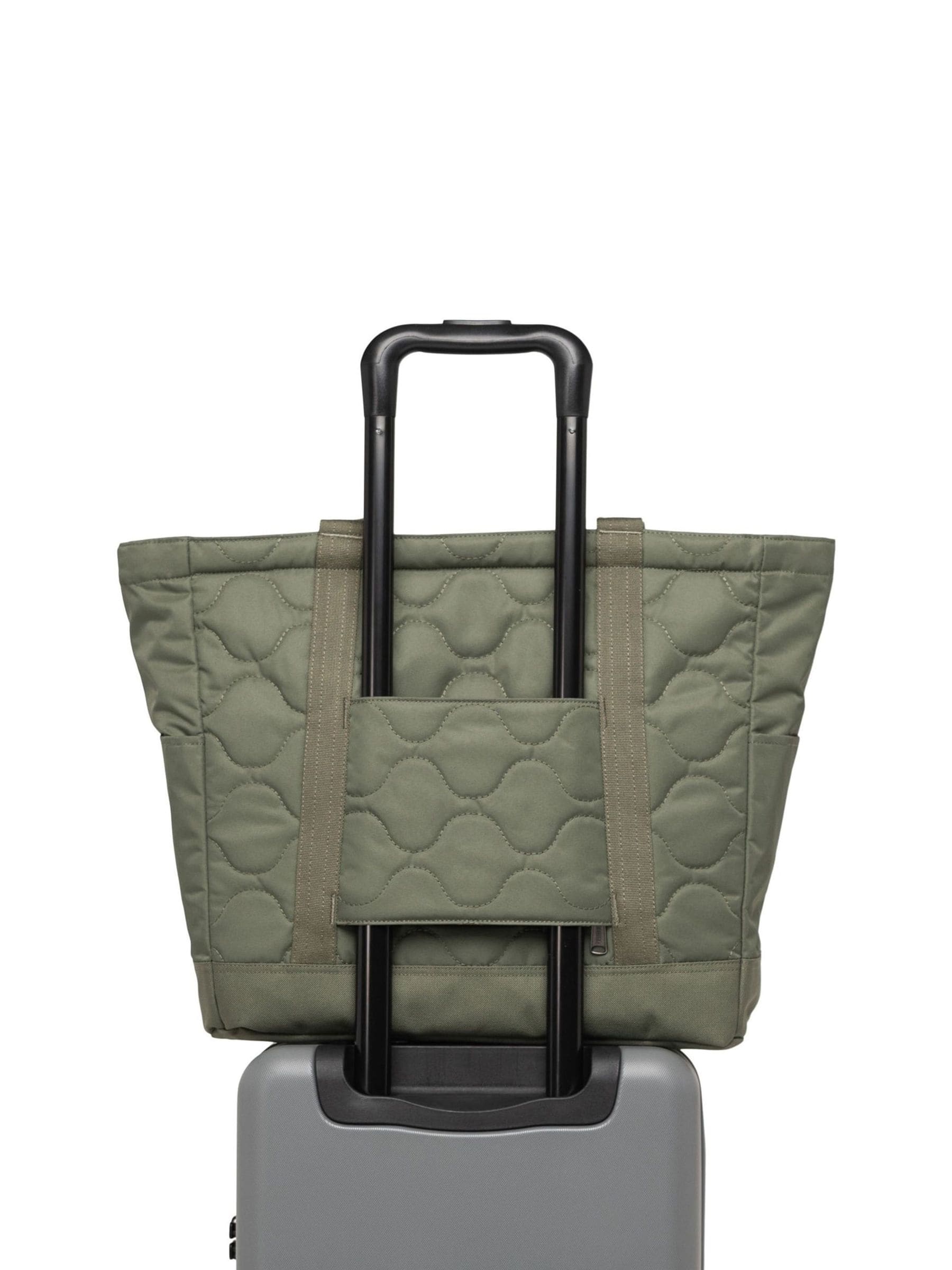 Herschel green heritage quilted capsule tote bag, imported from the UK