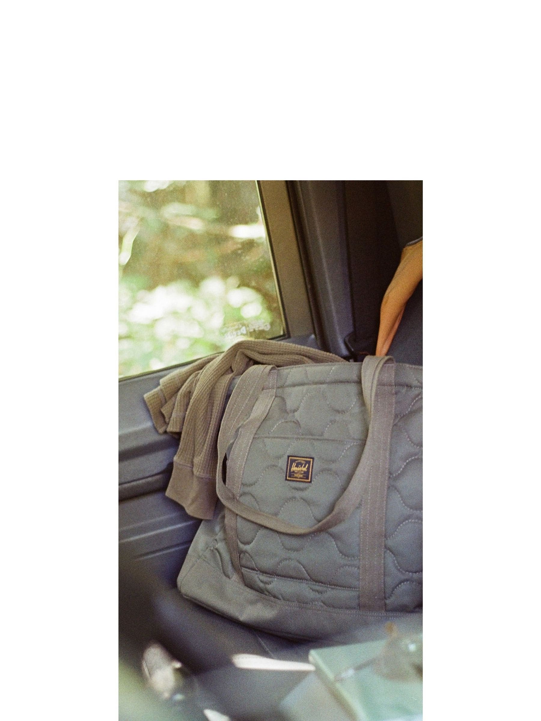 Herschel green heritage quilted capsule tote bag, imported from the UK