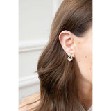 SVNX studded bow earrings with hanging pearl in gold, UK version