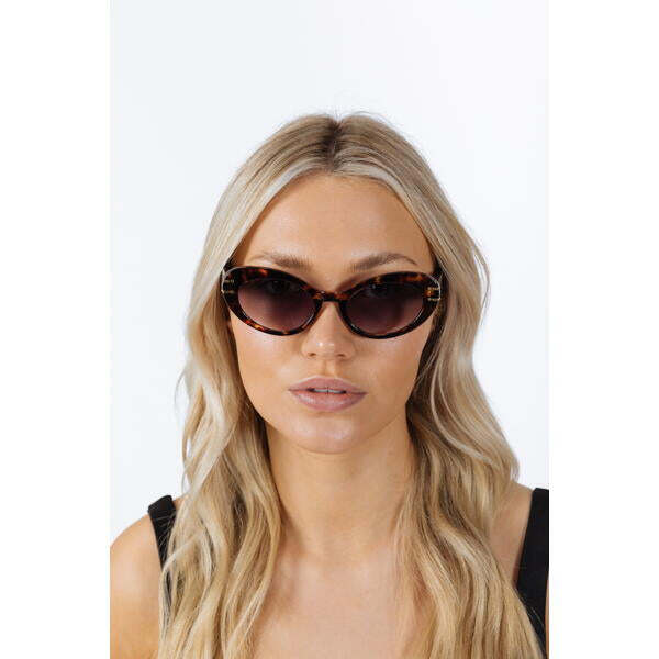 SVNX oval cat-eye sunglasses in tortoise, imported from the UK