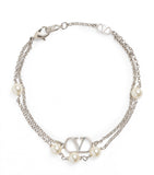 Valentino Garavani faux pearl VLogo bracelet - British product