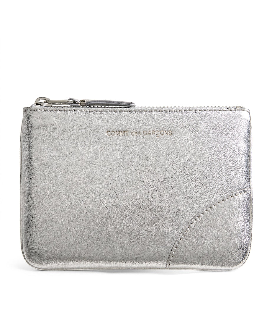 Comme Des Garçons Wallet small leather pouch silver, UK version