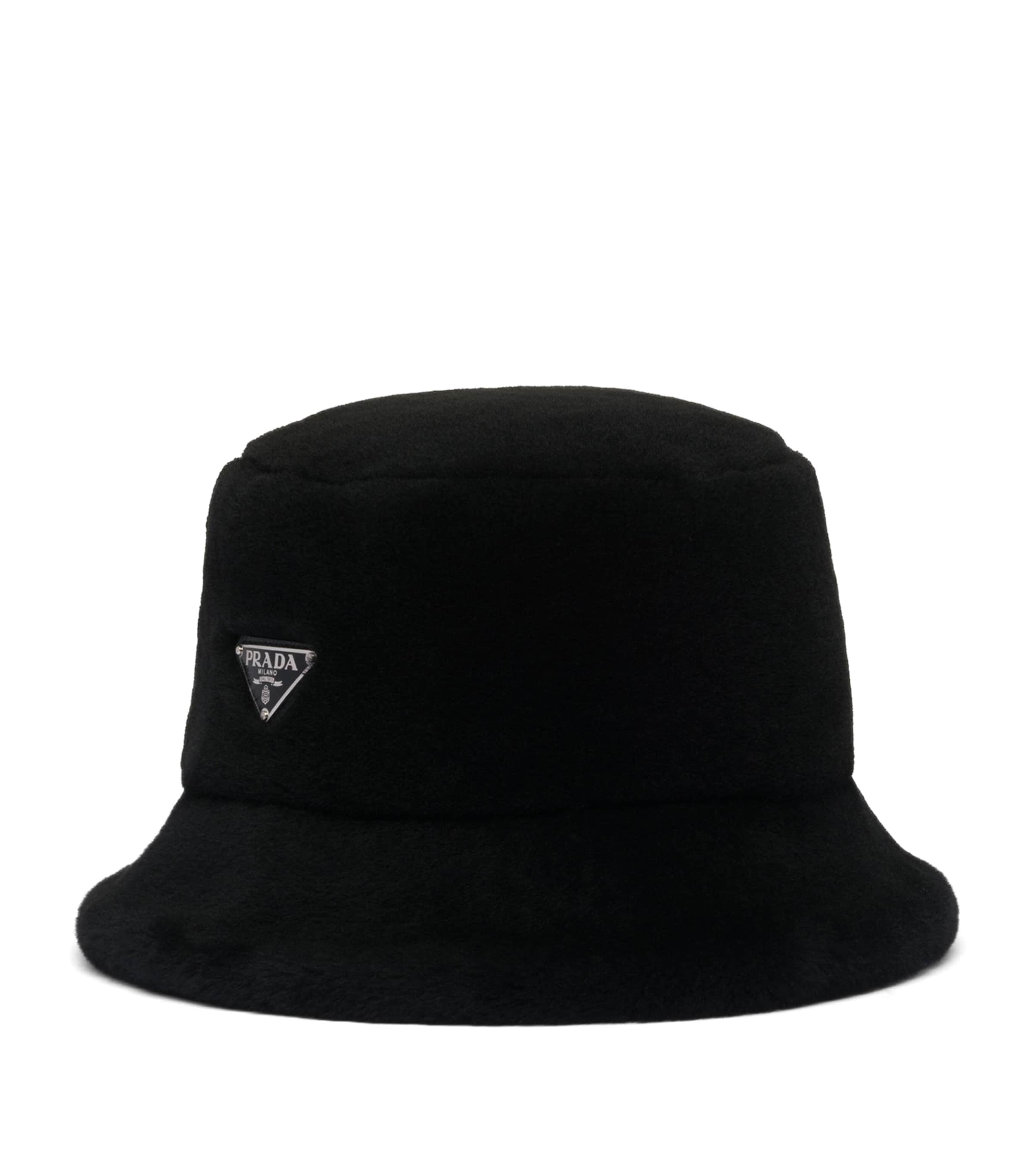 Prada shearling bucket hat with iconic Triangle logo, imported from the UK