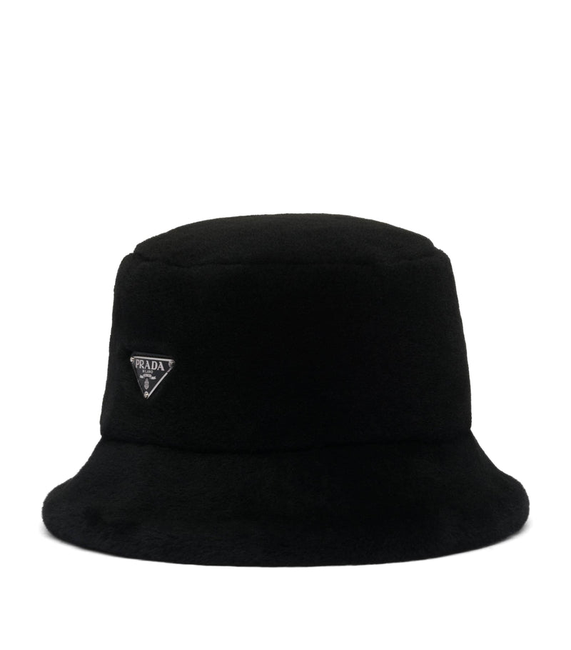 Prada shearling bucket hat with iconic Triangle logo, imported from the UK