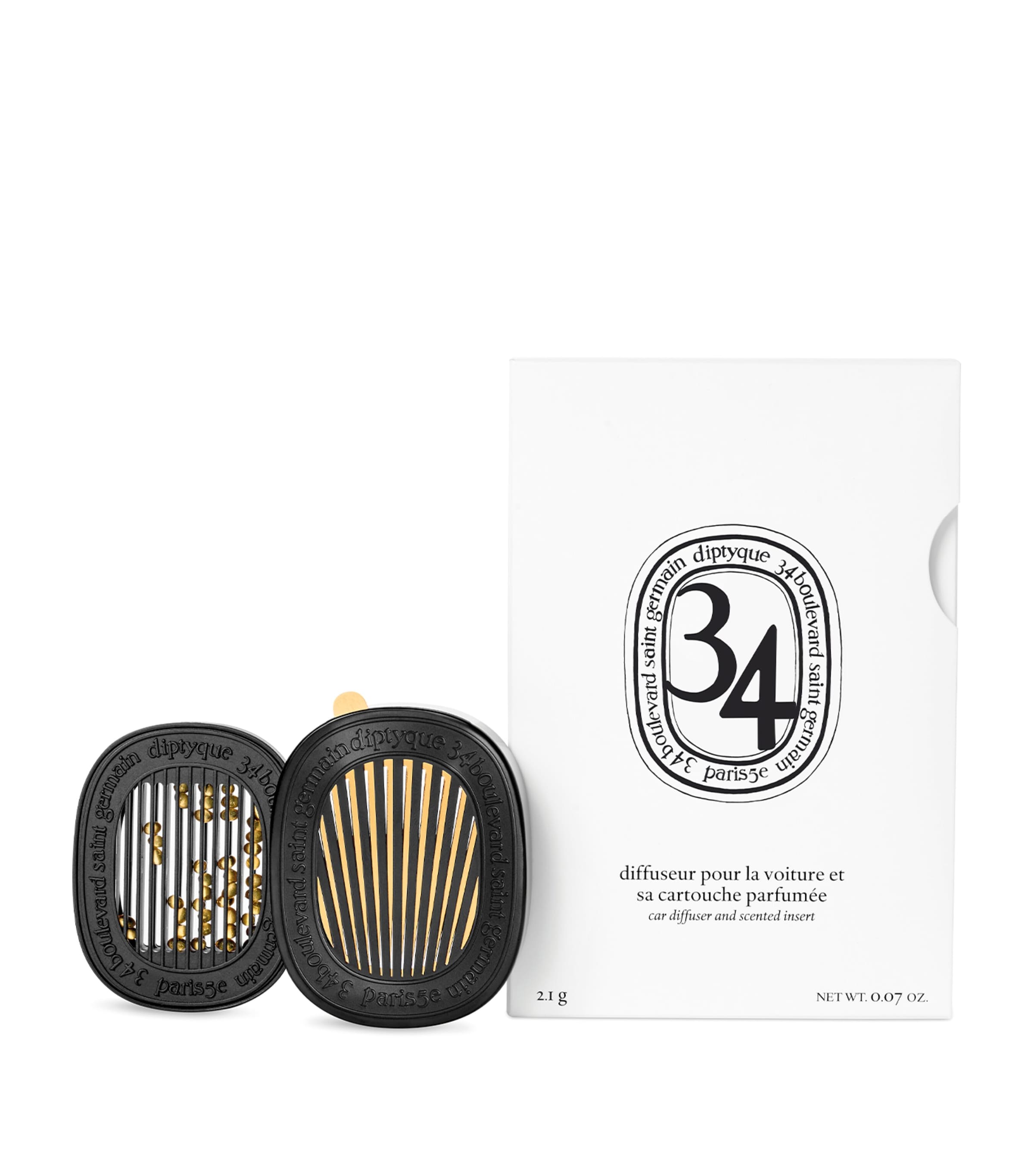 Diptyque car diffuser and refill with moss, blackcurrant, and fig leaf scent - British product