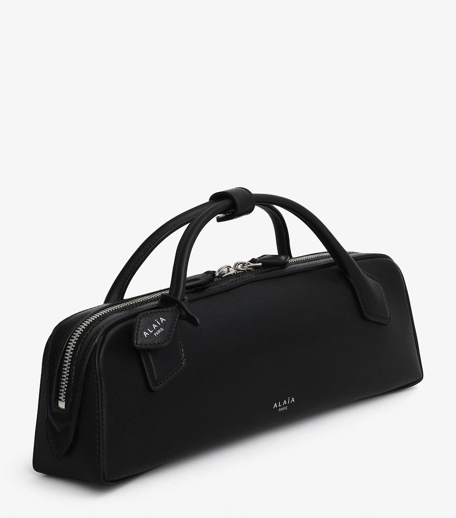 Alaïa Le Teckel top-handle bag in small frame (British brand)