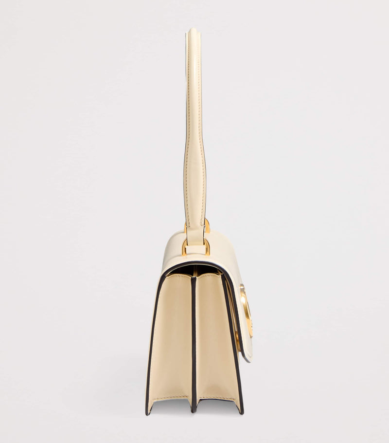 Valentino Garavani Vain top-handle leather bag, imported from the UK