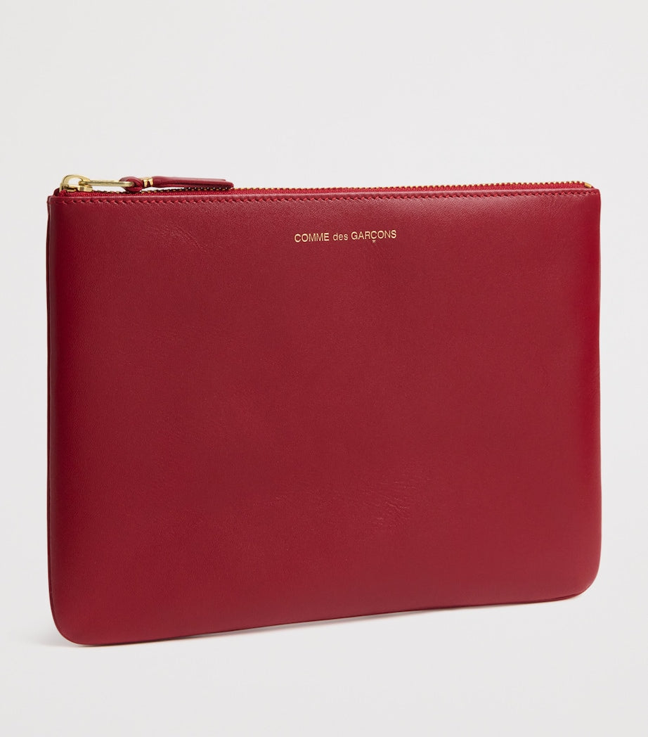 Comme des Garçons large leather zipped pouch - British product