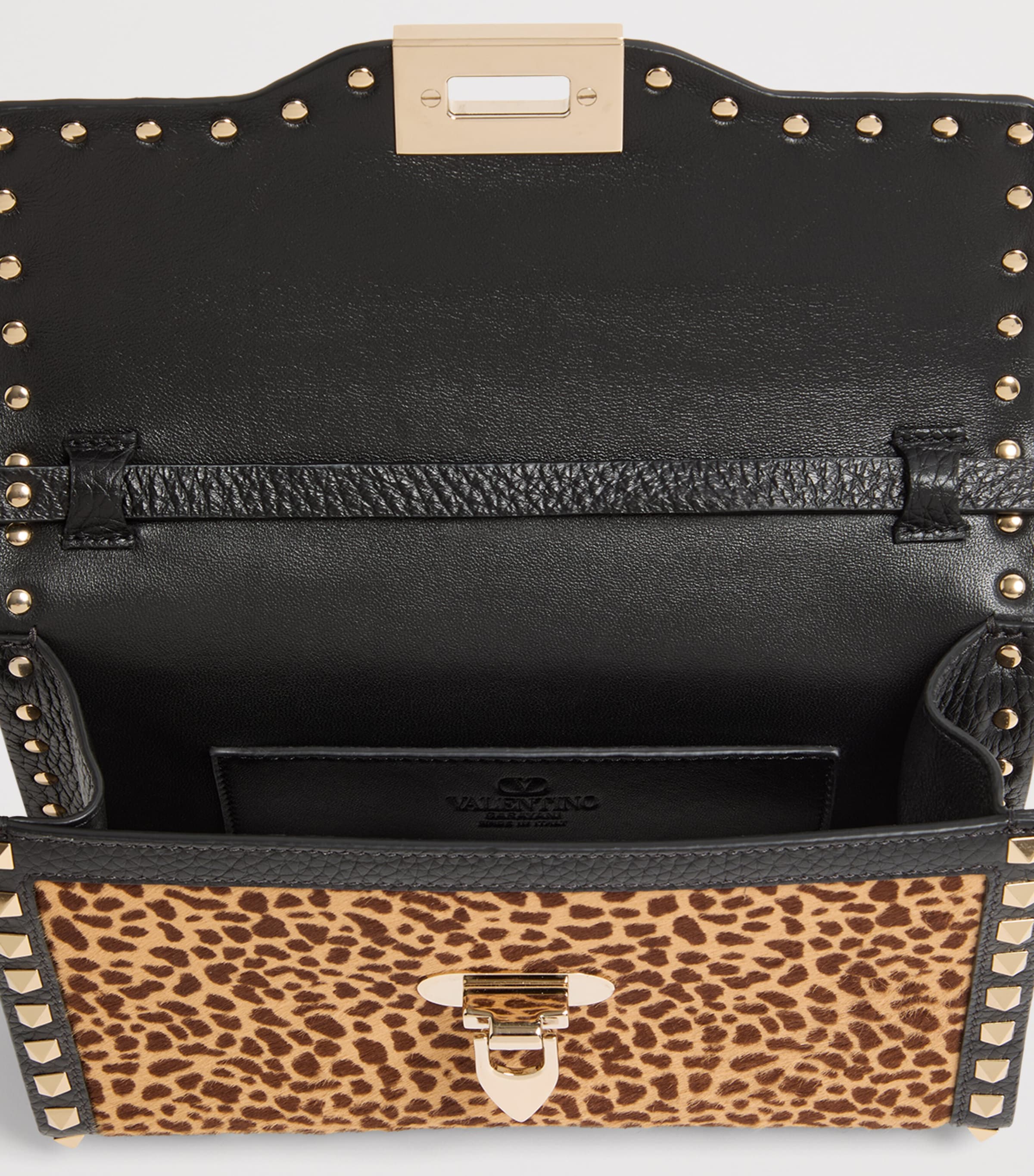 Valentino Garavani small leather rockstud shoulder bag (British brand)