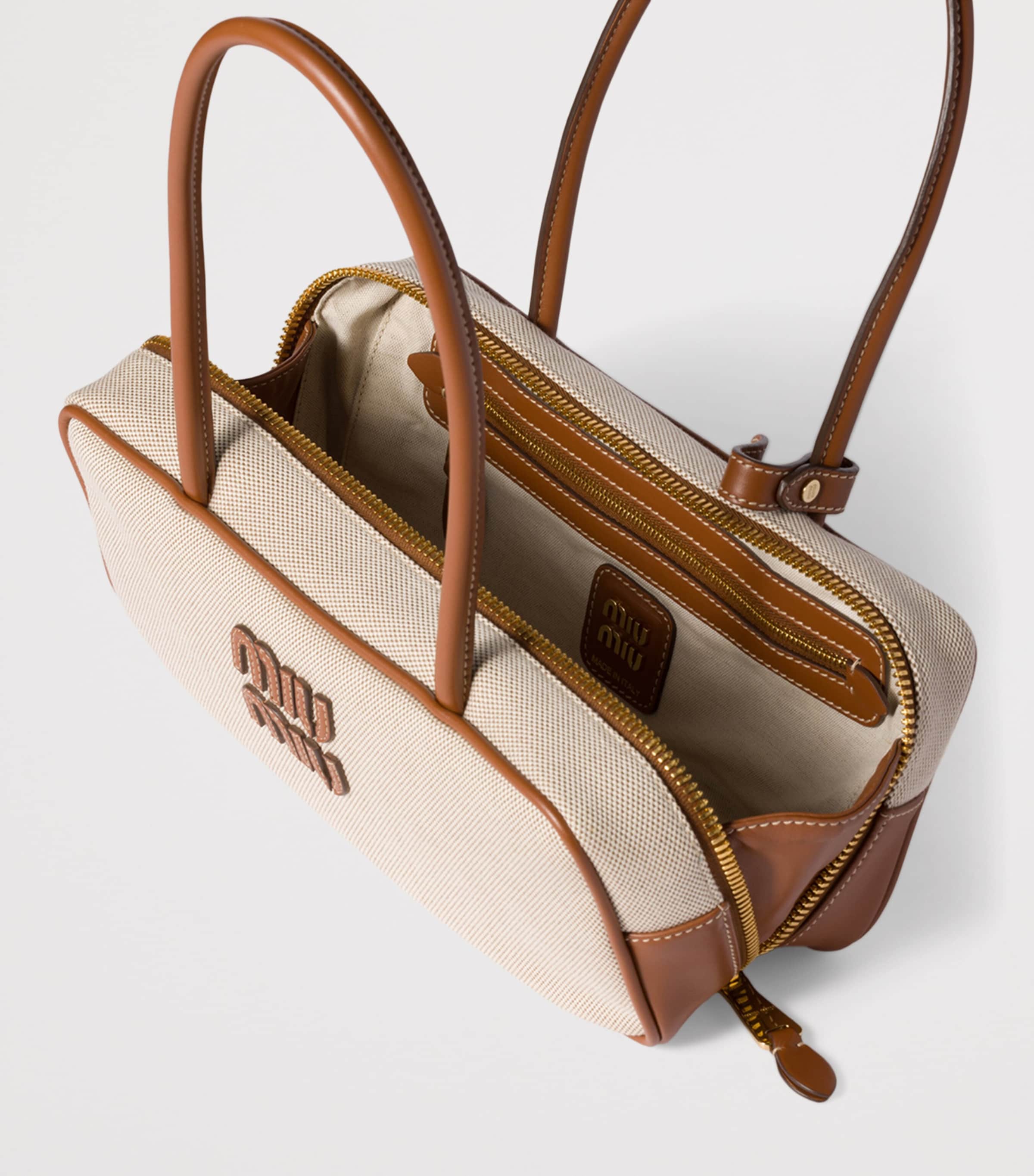 Miu Miu Beau top-handle bag 11x28x8cm (British brand)