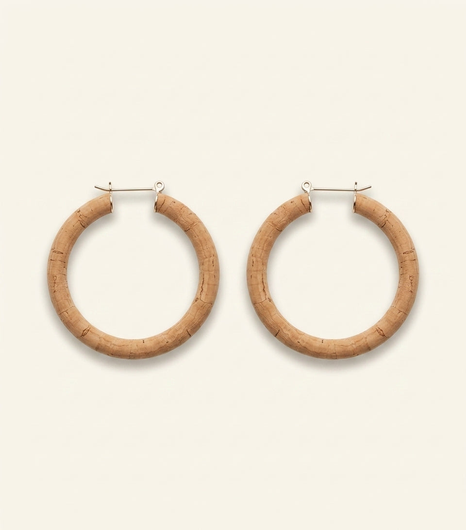Balenciaga polished copper hoop earrings, imported from the UK