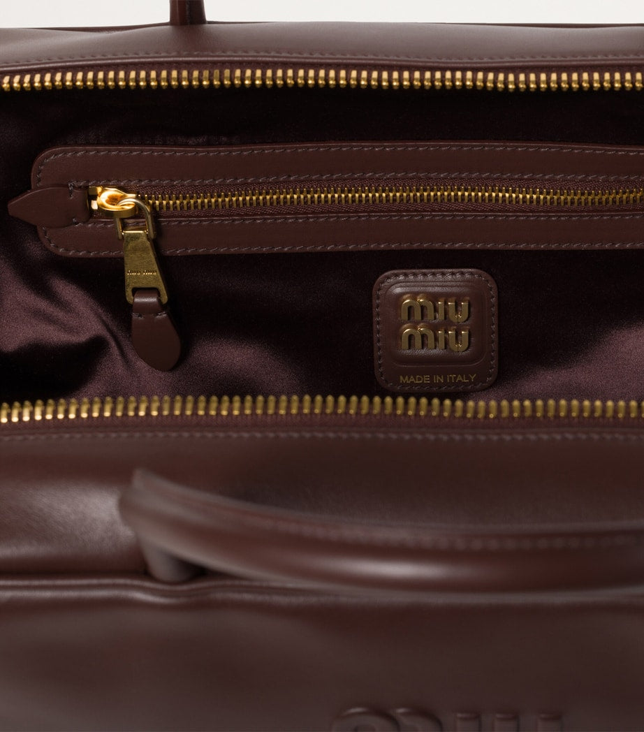 Miu Miu Beau top-handle bag in Italian calfskin leather, imported from the UK