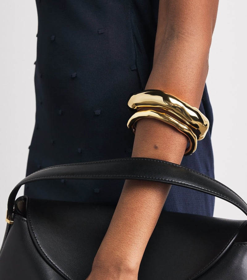 Alexis Bittar gold-plated bangle, UK version