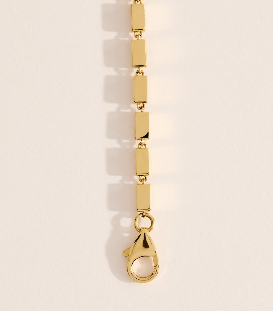 Suzanne Kalan yellow gold block-chain ID bracelet, imported from the UK