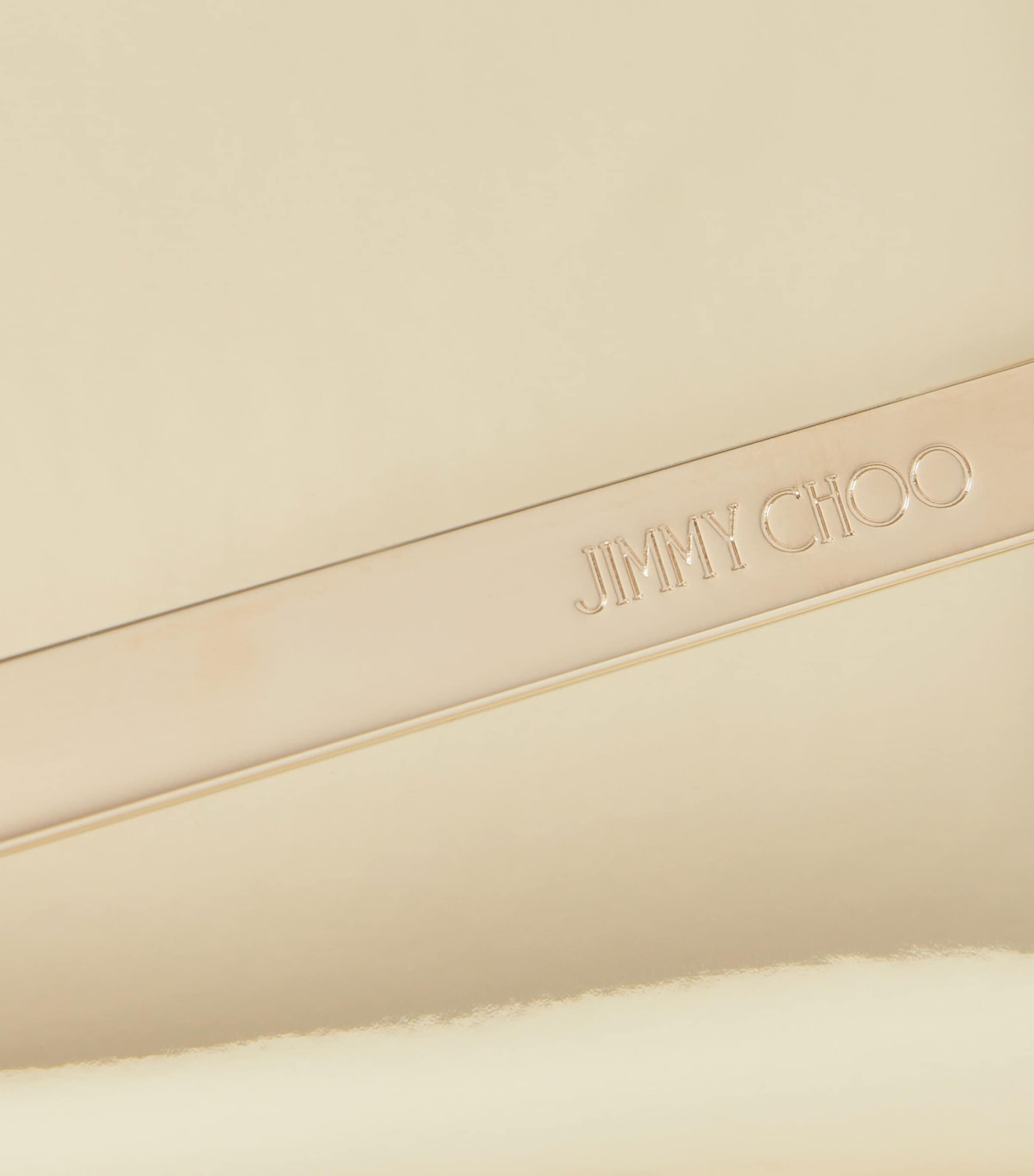 Jimmy Choo Emmie clutch bag with metallic finish, imported from the UK