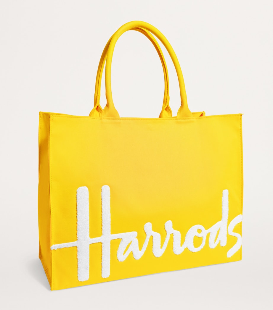 Harrods large cotton logo tote bag in vibrant yellow, UK version