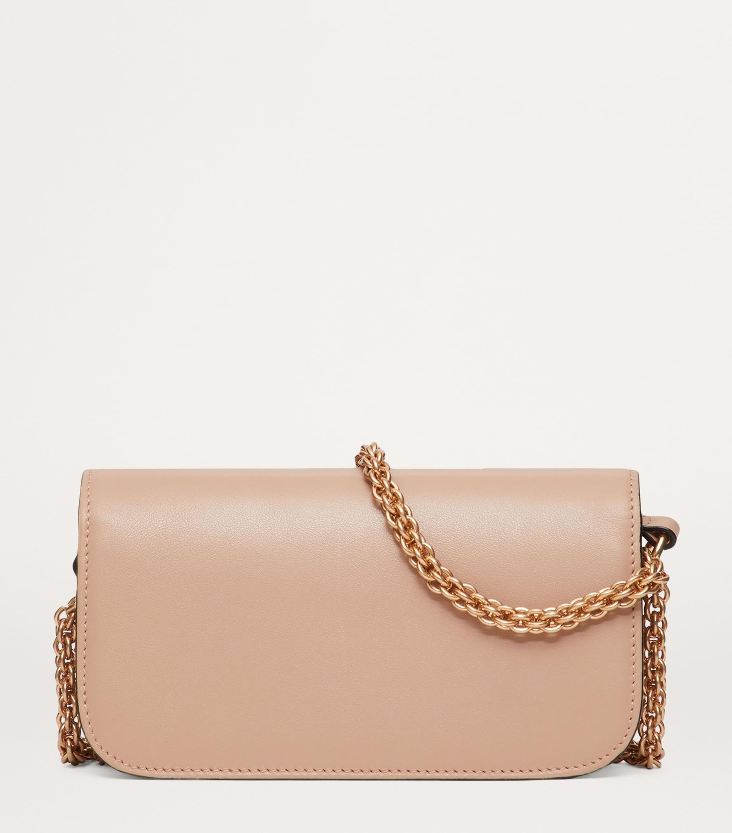 Valentino Garavani Small Leather Locò shoulder bag, imported from the UK