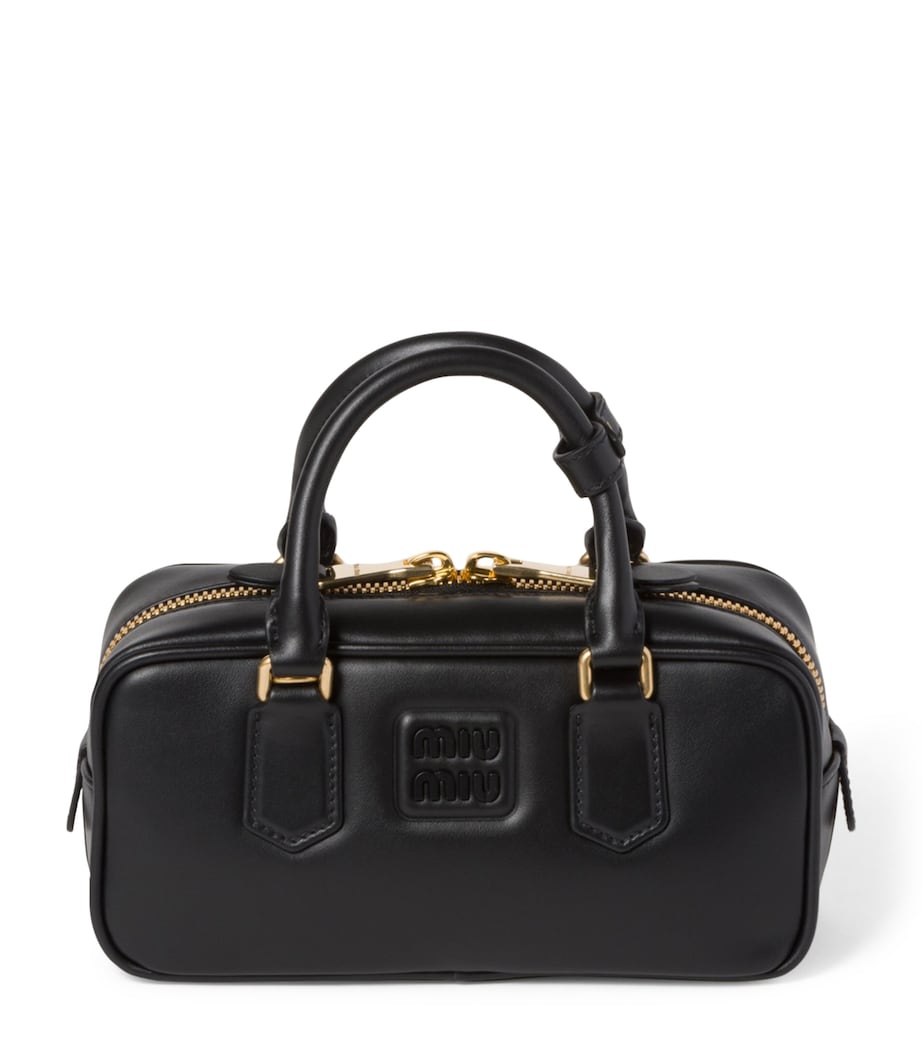 Miu Miu Arcadie top-handle bag in leather, imported from the UK