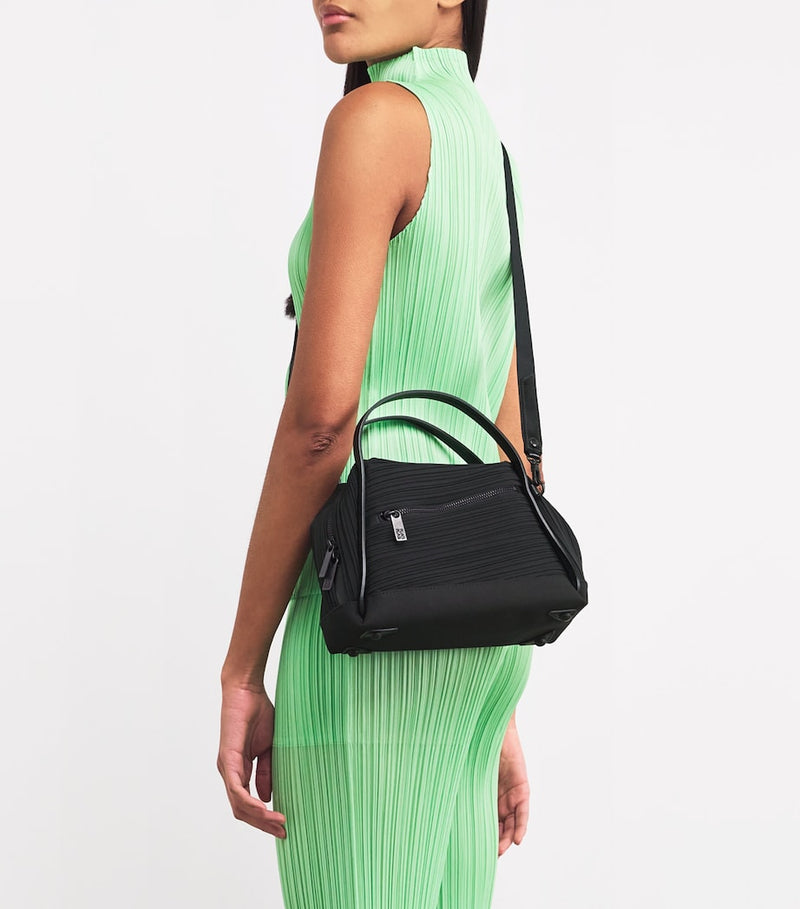 Pleats Please Issey Miyake mini bias pleats duffle bag, imported from the UK