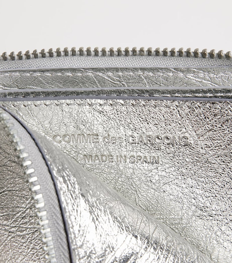 Comme des Garçons small leather half-zip wallet, UK version