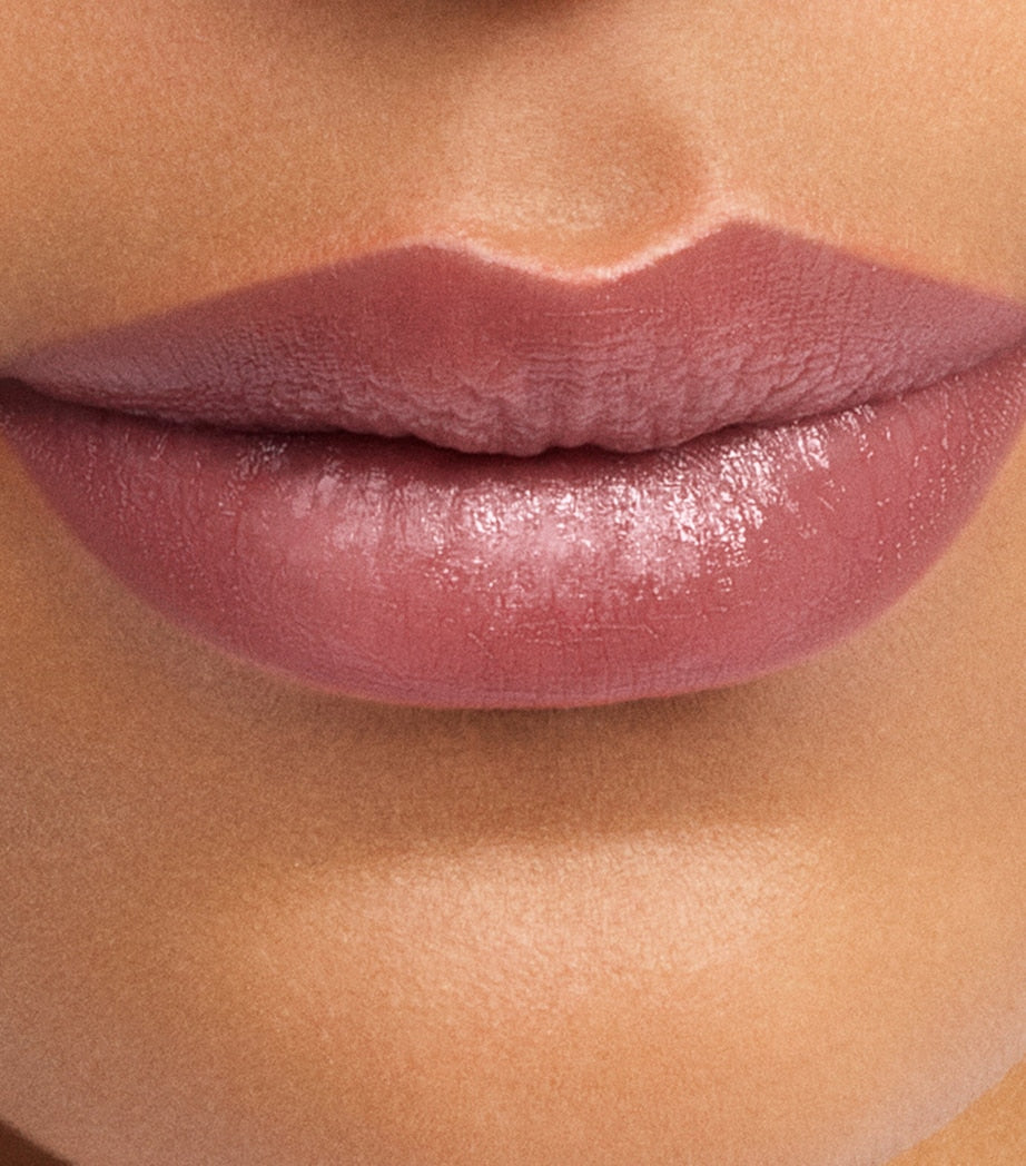 Carolina Herrera mini tinted lip balm with sheer finish (British brand)